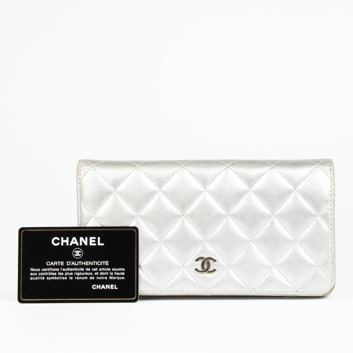 Shop this 100% authentic Chanel Silver Lambskin Quilted Long Wallet at labellov.com