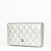 Shop this 100% authentic Chanel Silver Lambskin Quilted Long Wallet at labellov.com