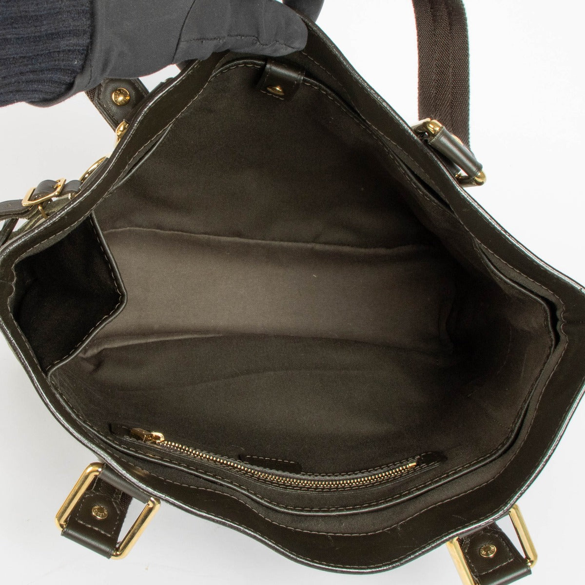 Shop this 100% authentic Louis Vuitton Green Monogram Canvas Lucille GM Bag at labellov.com