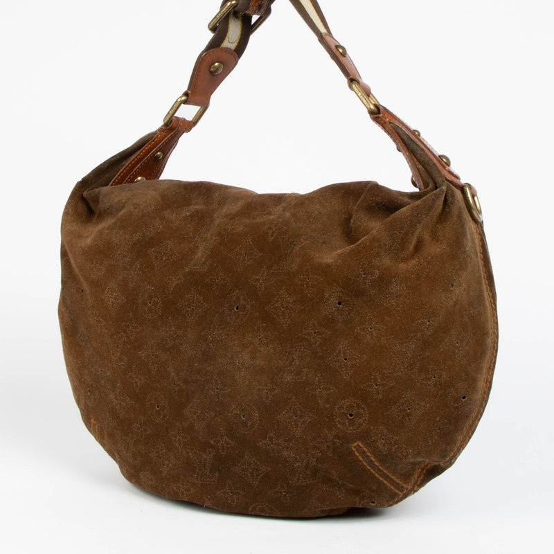 Shop this 100% authentic Louis Vuitton Brown Suede Onatah Hobo Bag at labellov.com