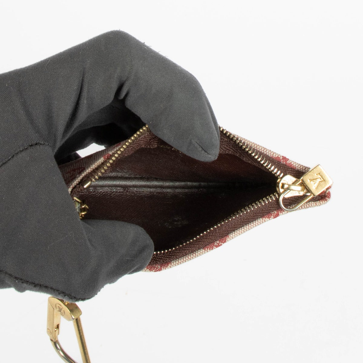 Shop this 100% authentic Louis Vuitton Bordeaux Monogram Key Pouch at labellov.com
