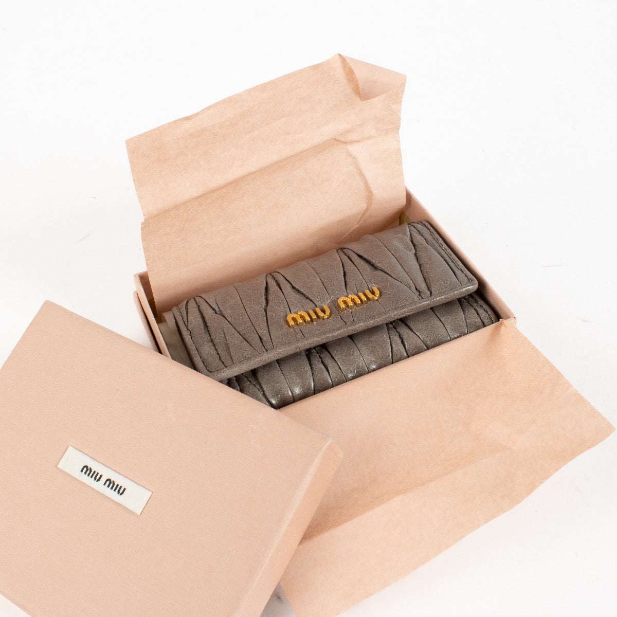 authentic preloved Miu Miu Grey Matelasse Keywallet on Labellov.com