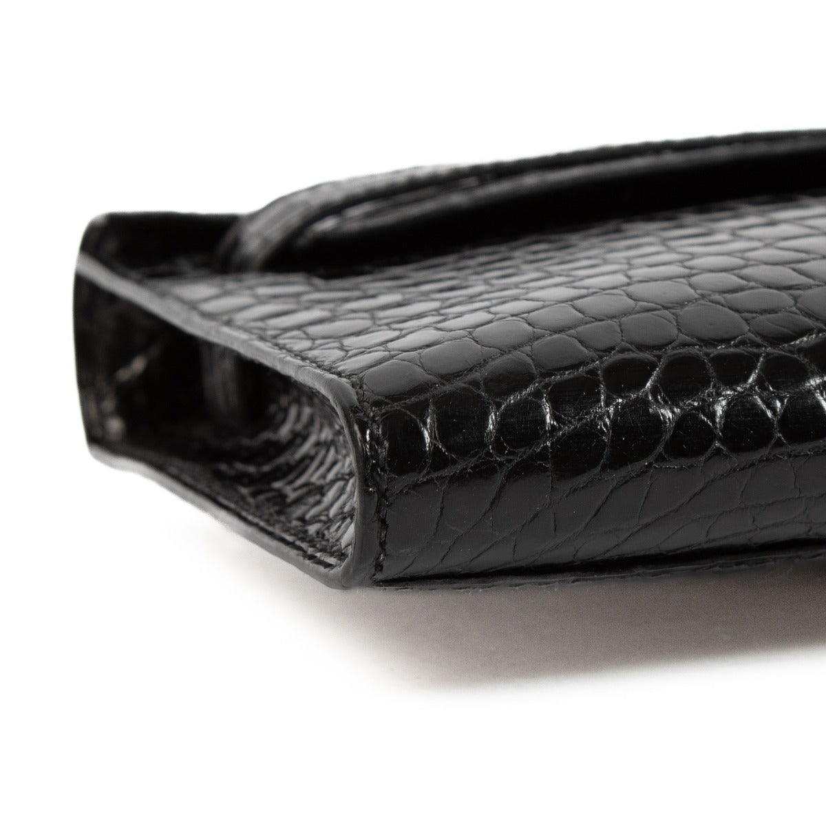 Authentic second hand Hermès Kelly Cut Pochette Black Shiny Crocodile Porosus PHW on www.labellov.com