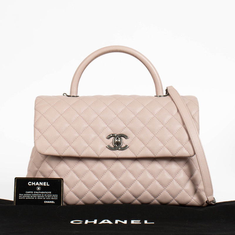 Authentic pre-loved Chanel Pink Caviar Large Coco Handle Bag on Labellov.com