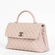 Authentic pre-loved Chanel Pink Caviar Large Coco Handle Bag on Labellov.com