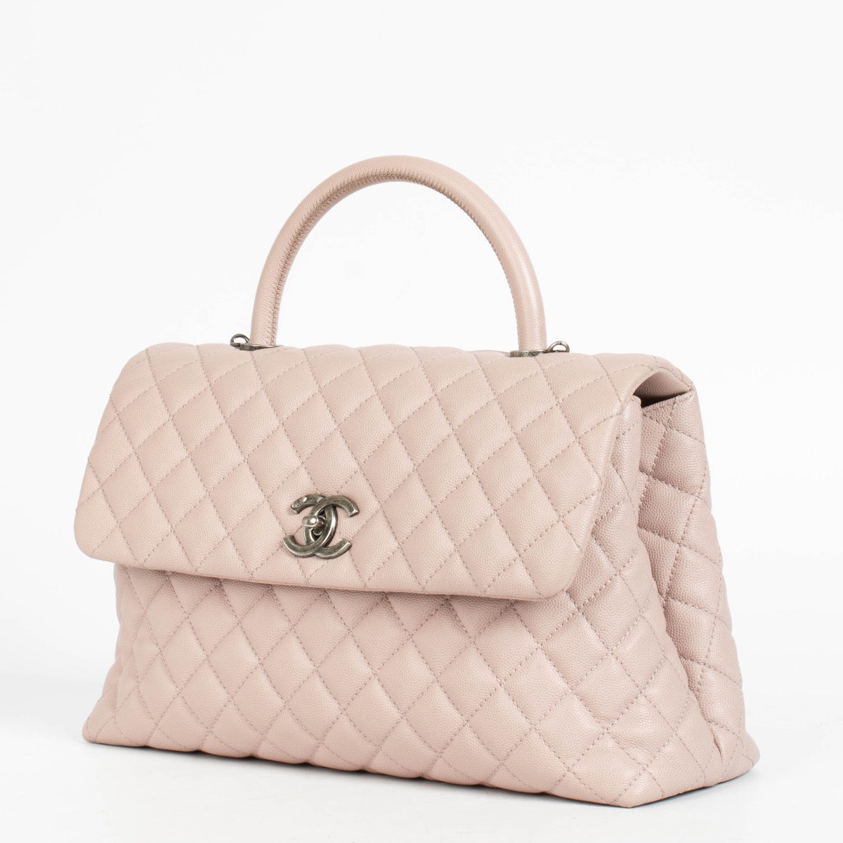 Authentic pre-loved Chanel Pink Caviar Large Coco Handle Bag on Labellov.com