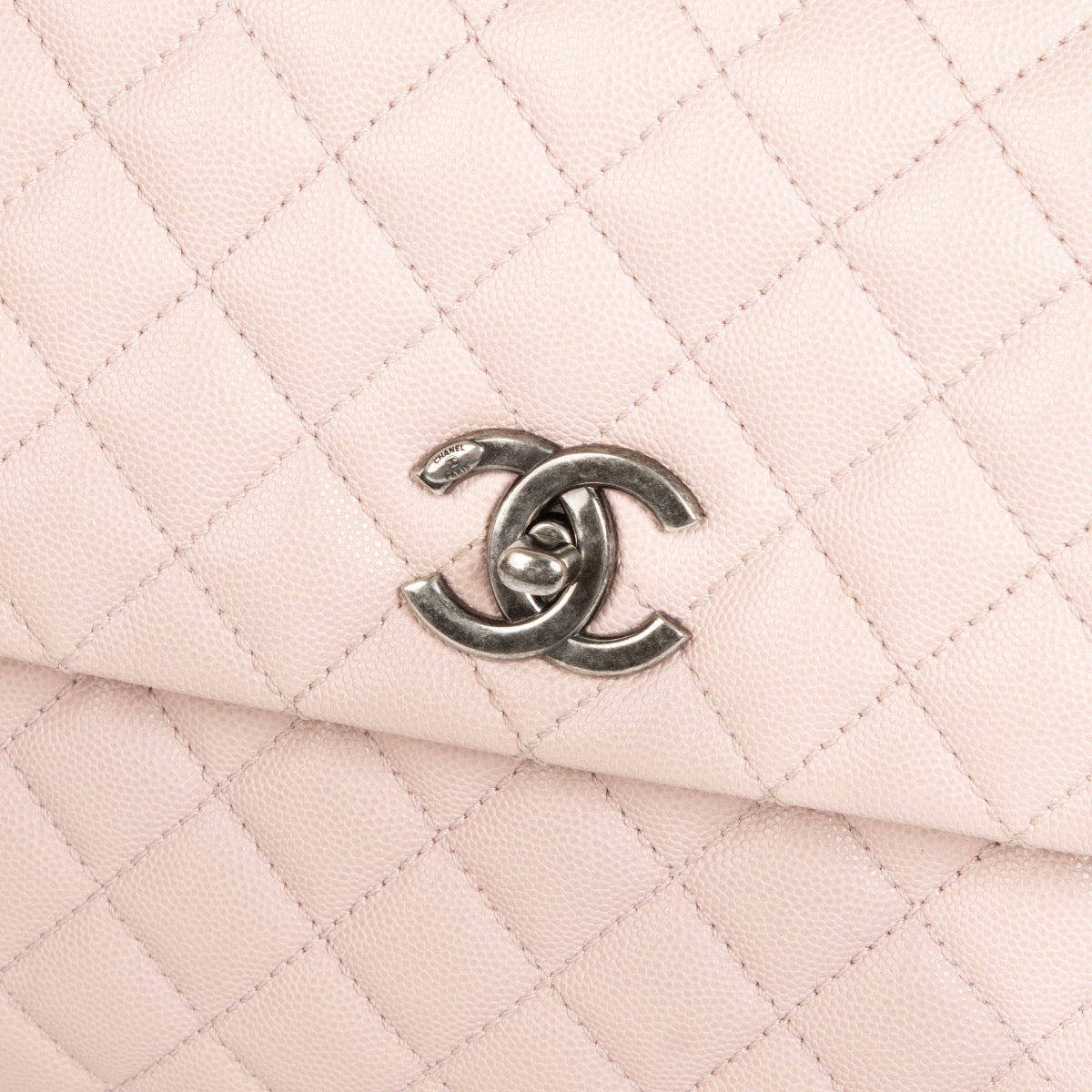 Authentic pre-loved Chanel Pink Caviar Large Coco Handle Bag on Labellov.com
