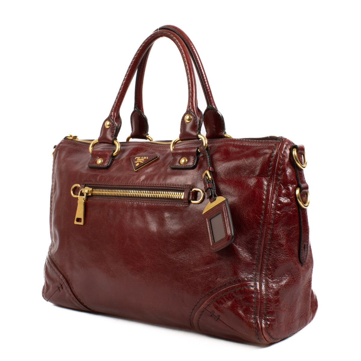 shop 100% authentic second hand Prada Burgundy Leather Top Handle Bag on Labellov.com