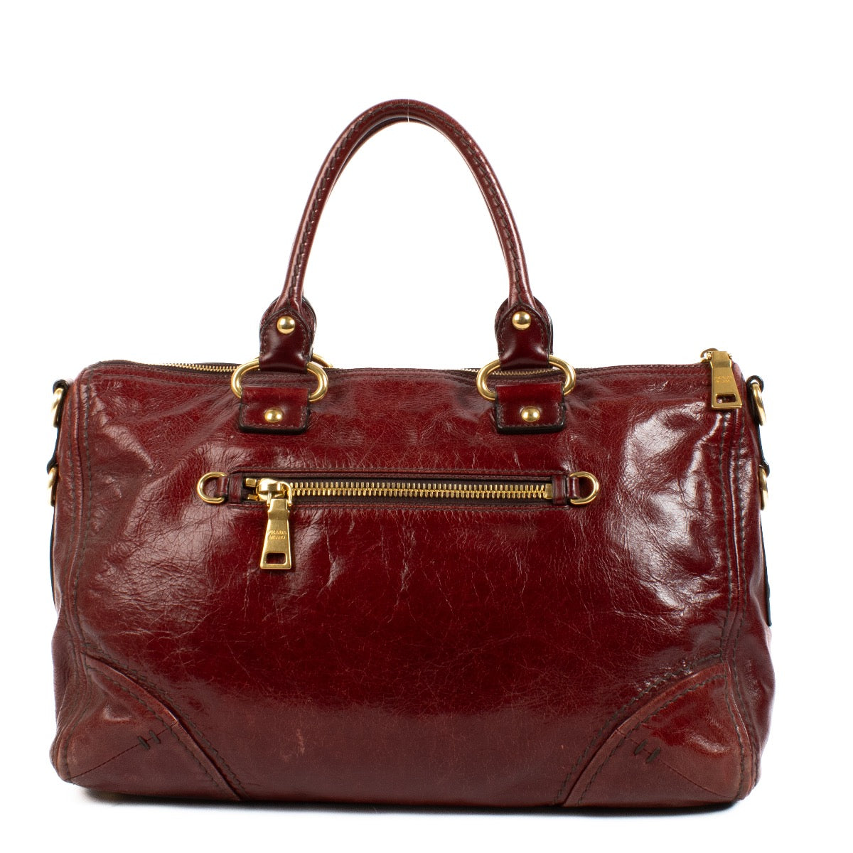 shop 100% authentic second hand Prada Burgundy Leather Top Handle Bag on Labellov.com