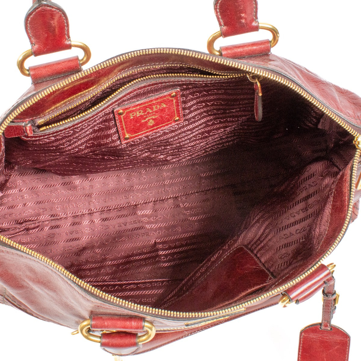 shop 100% authentic second hand Prada Burgundy Leather Top Handle Bag on Labellov.com