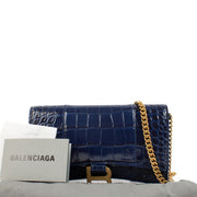 Shop safe online at Labellov in Antwerp, Brussels and Knokke this 100% authentic second hand Balenciaga Blue Croc Embossed Hourglass Chain Wallet.