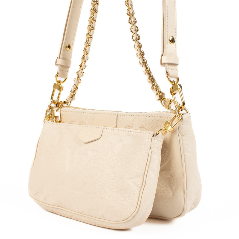 buy 100% authentic pre loved Louis Vuitton White Monogram Empreinte Multi Pochette Accessoires on Labellov.com