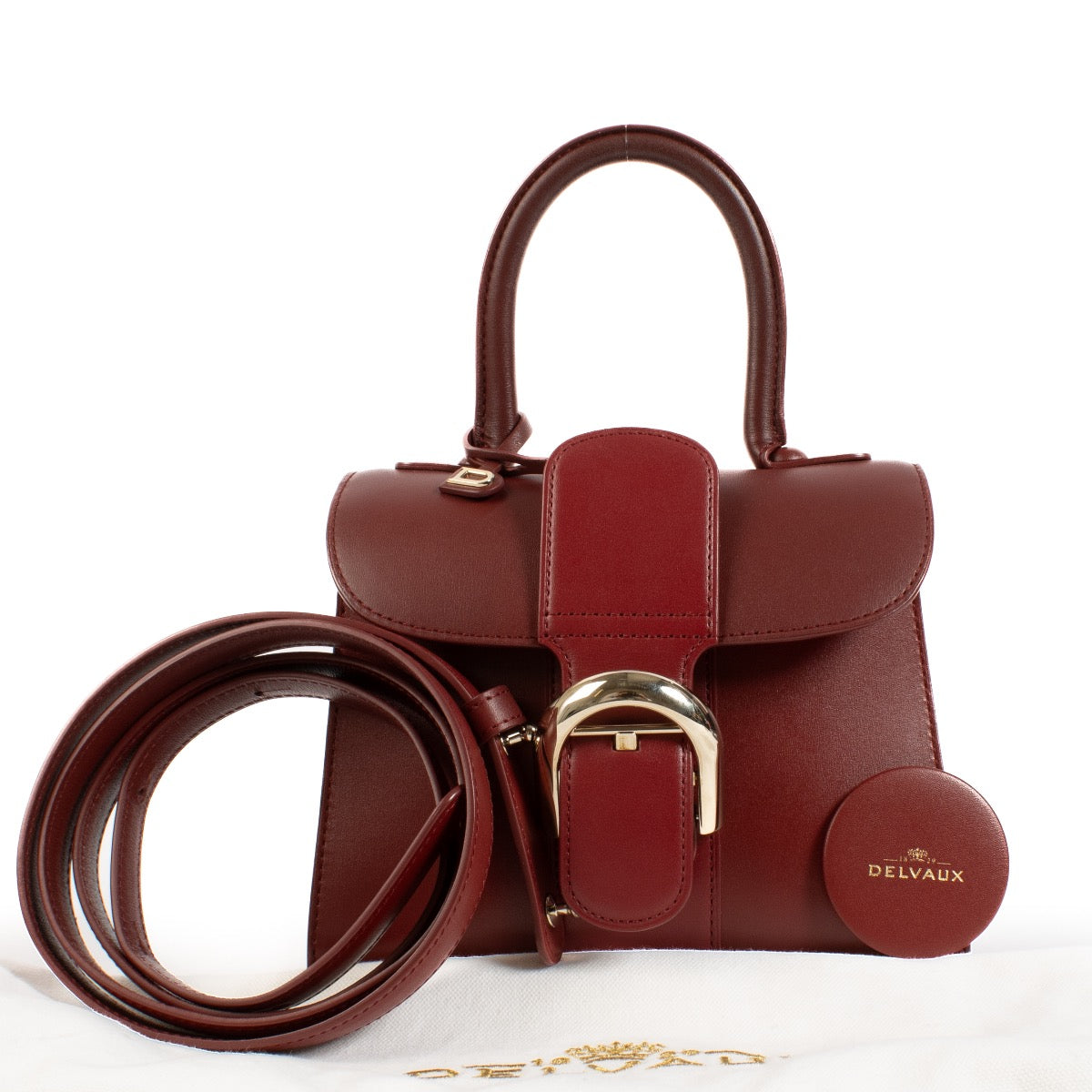 buy 100% authentic pre loved Delvaux Burgundy Box Calf Brillant Mini on Labellov.com