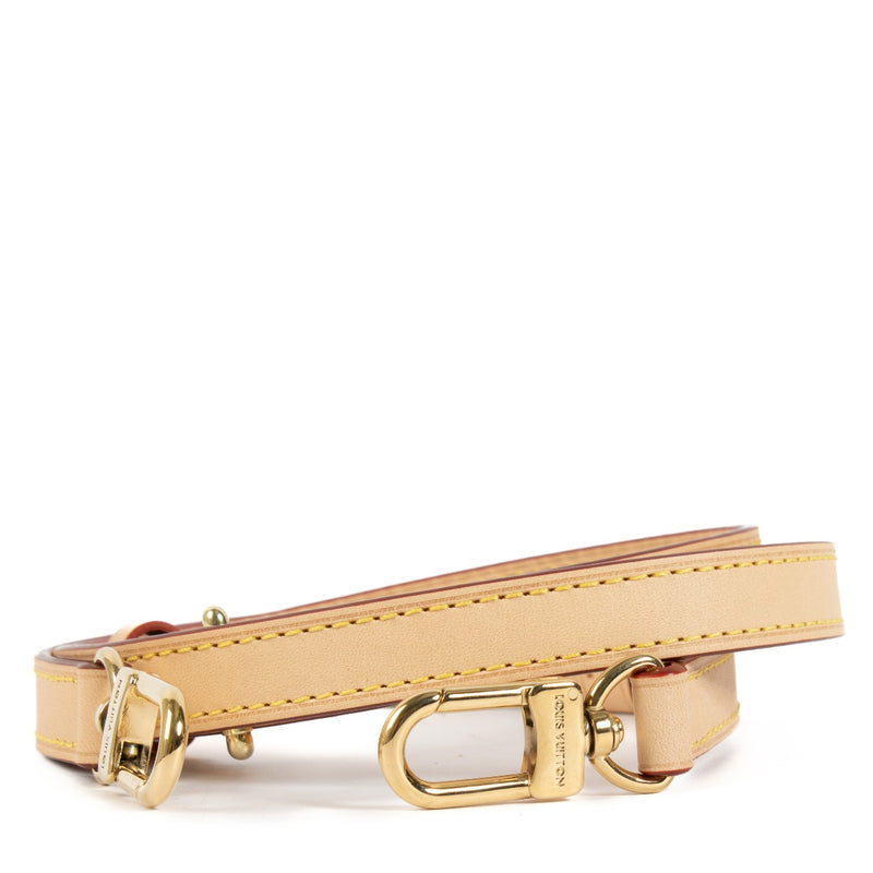 Louis Vuitton Adjustable Shoulder Strap 16mm in natural Vachetta leather with gold-tone hardware, featuring an adjustable length for crossbody or shoulder wear. Shop now on Labellov.com.