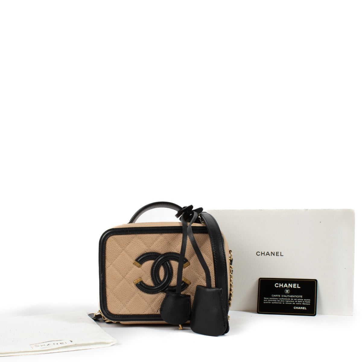 Shop 100% authentic second hand Chanel Beige And Black Vanity Bag on Labellov.com