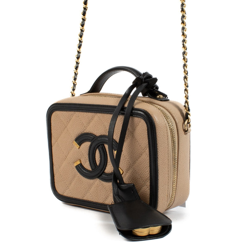 Shop 100% authentic second hand Chanel Beige And Black Vanity Bag on Labellov.com