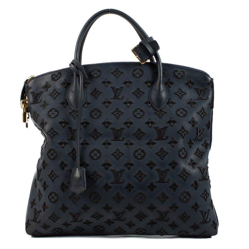 Buy authentic second hand Louis Vuitton Bicolor Blue Rubber Addiction LockIt MM Bag at Labellov.com