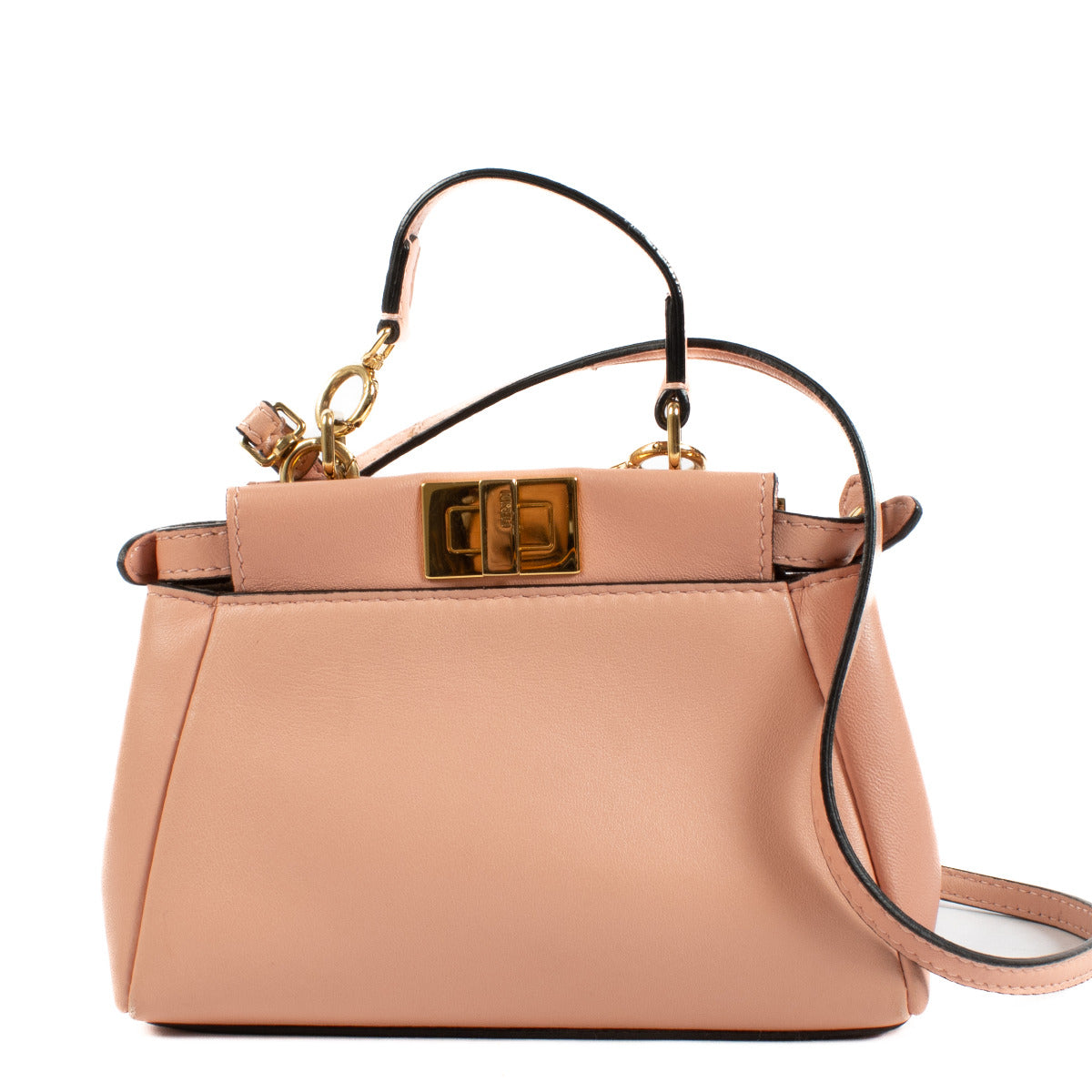 Playful yet sophisticated, this Fendi Pink Micro Peekaboo Bag is the perfect pop of color for your wardrobe. Crafted from smooth leather in a soft pink hue, this miniature version of Fendi’s iconic Peekaboo design is both charming and versatile.