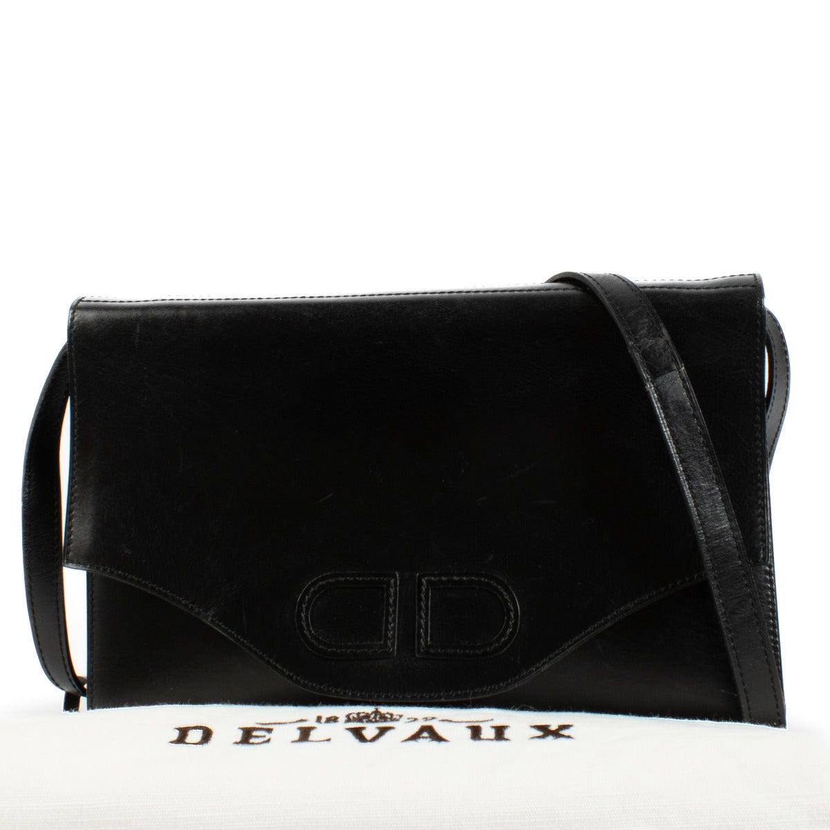 The Delvaux Vintage Black Crossbody Bag is a distinguished accessory, expertly crafted from high-quality black leather. Buy now on Labellov.com.