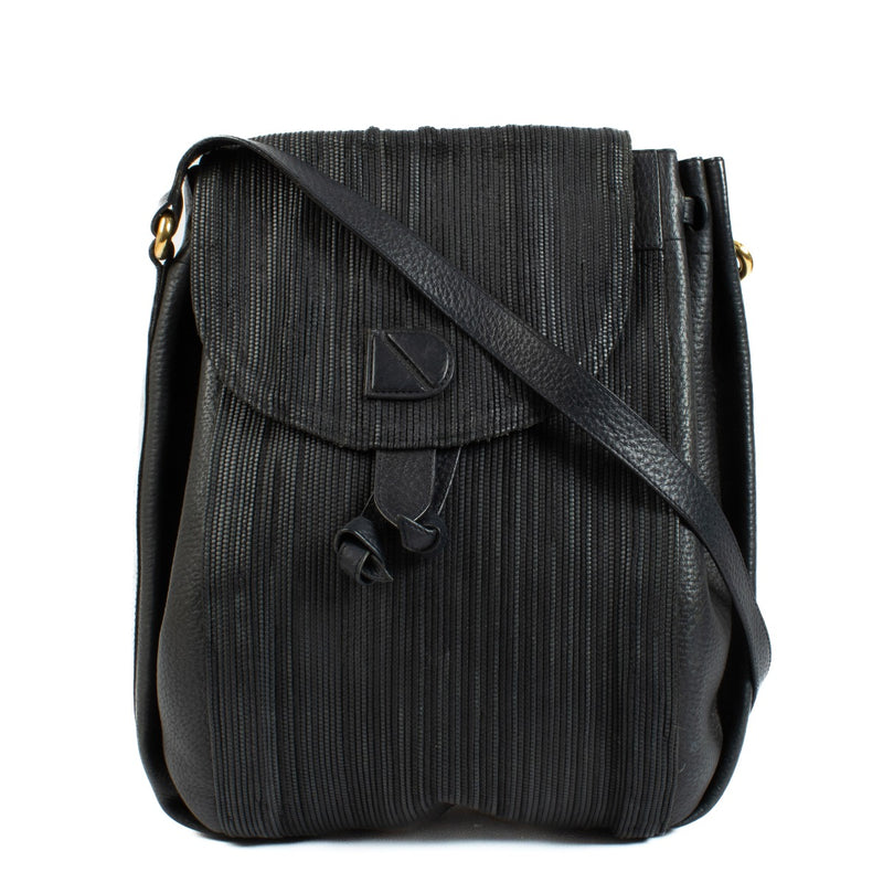 Delvaux dark blue bag with Toile de Cuir center panel and leather sides, featuring a fully leather-lined interior. Shop now on Labellov.com.