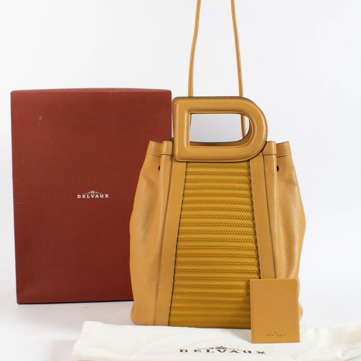 Shop 100% authentic second hand Delvaux Yellow Toile De Cuir Top Handle on Labellov.com
