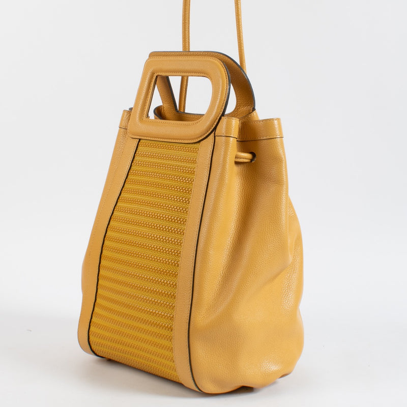 Shop 100% authentic second hand Delvaux Yellow Toile De Cuir Top Handle on Labellov.com