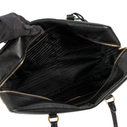 Shop safe online at Labellov in Antwerp, Brussels and Knokke this 100% authentic second hand Prada Black Saffiano Leather Boston Top Handle. Veilig online tweedehands authentiek Prada Black Saffiano Leather Boston Top Handle handtas bij Labellov kopen.