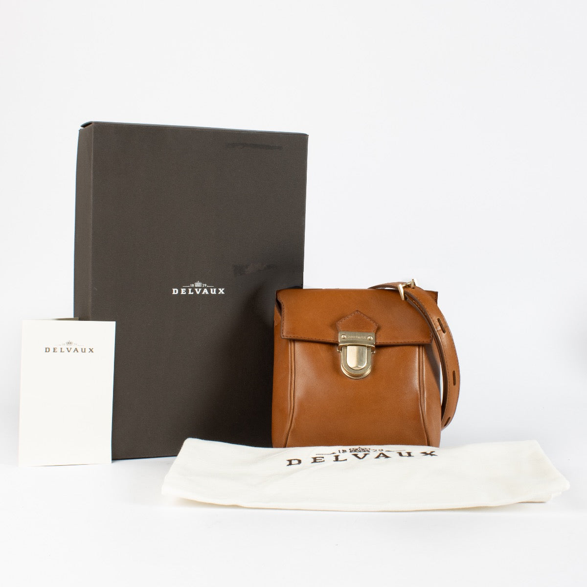 Delvaux Cognac Bridon Coquin Baudrier Pochette PM