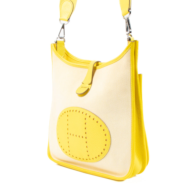 Hermès Evelyne 29 Ecru Toile Lime Yellow Leather Bag pour le meilleur prix chez Labellov à Anvers et Knokke.