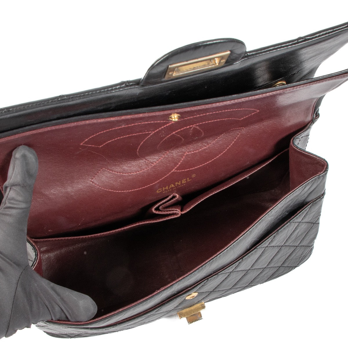 Shop safe online at Labellov in Antwerp, Brussels and Knokke this 100% authentic second hand Chanel Black Aged Calfskin Maxi 2.55 Bag. Veilig online tweedehands authentieke Chanel Black Aged Calfskin Maxi 2.55 handtas kopen bij Labellov.