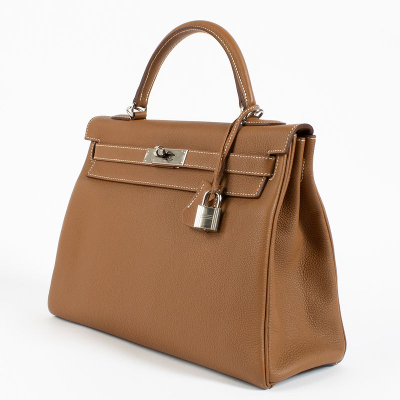 Authentic second hand brand new Hermès Kelly 32 Gold Togo PHW on www.labellov.com