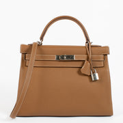 Authentic second hand brand new Hermès Kelly 32 Gold Togo PHW on www.labellov.com