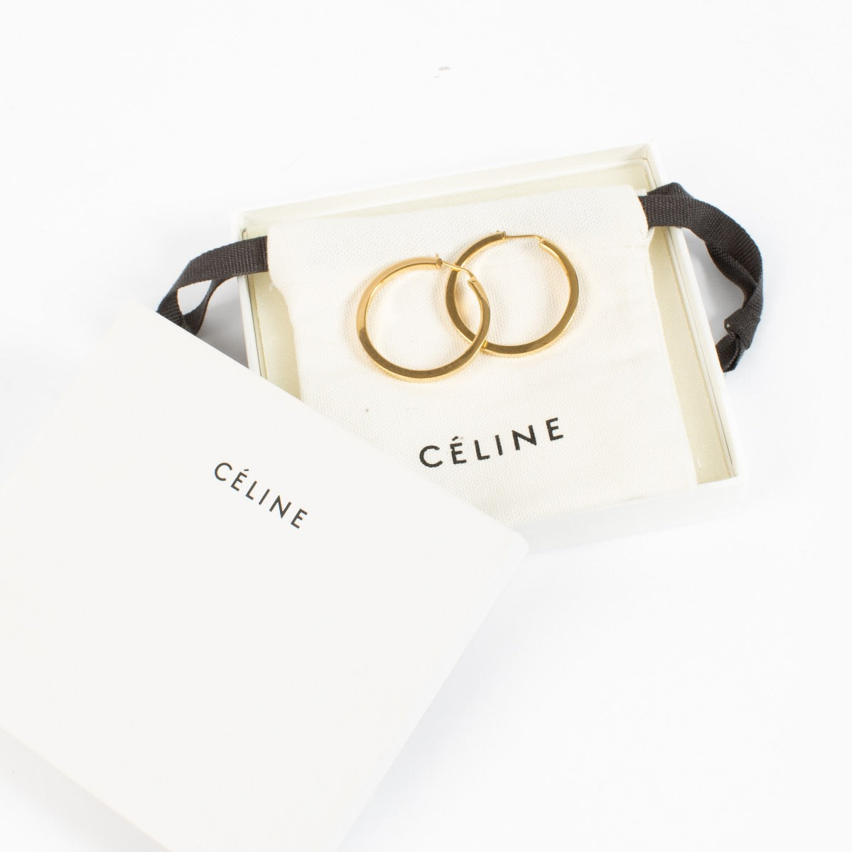 Shop safe online at Labellov in Antwerp, Brussels and Knokke these 100% authentic second hand Céline Gold Hoop Earrings
