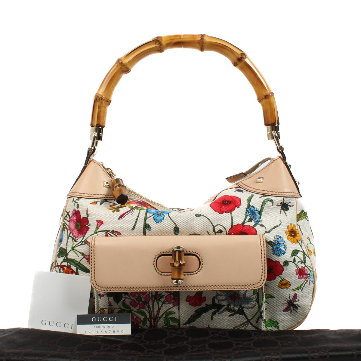 shop 100% authentic second hand Gucci White Flora Canvas Bamboo Top Handle Bag on Labellov.com