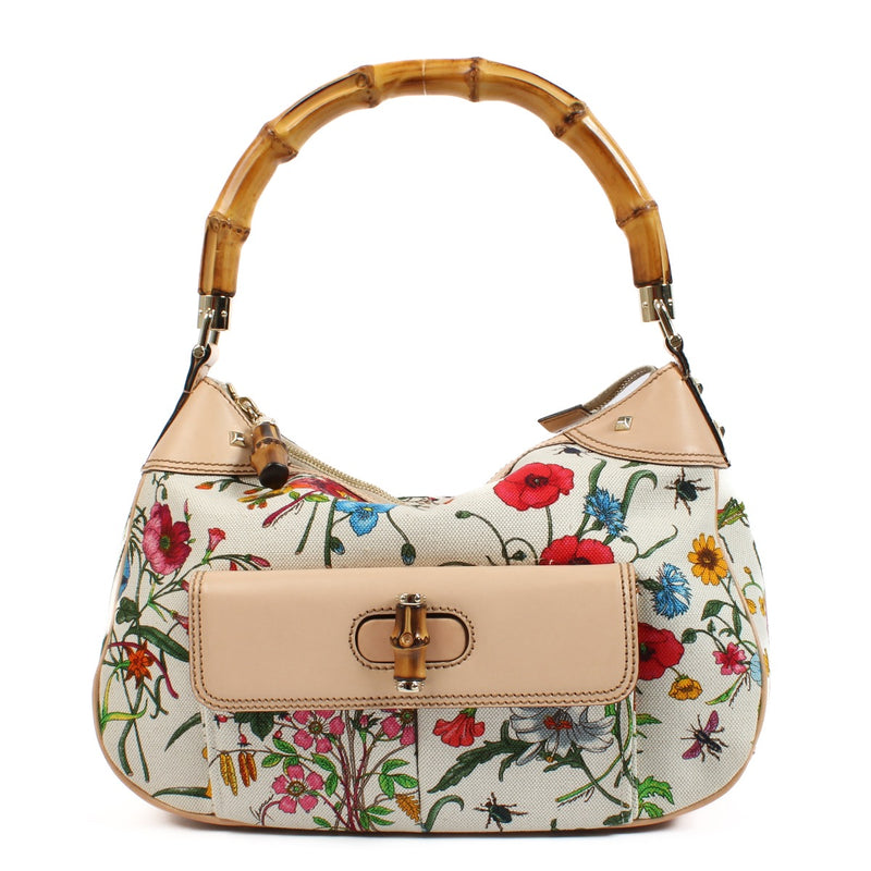 shop 100% authentic second hand Gucci White Flora Canvas Bamboo Top Handle Bag on Labellov.com