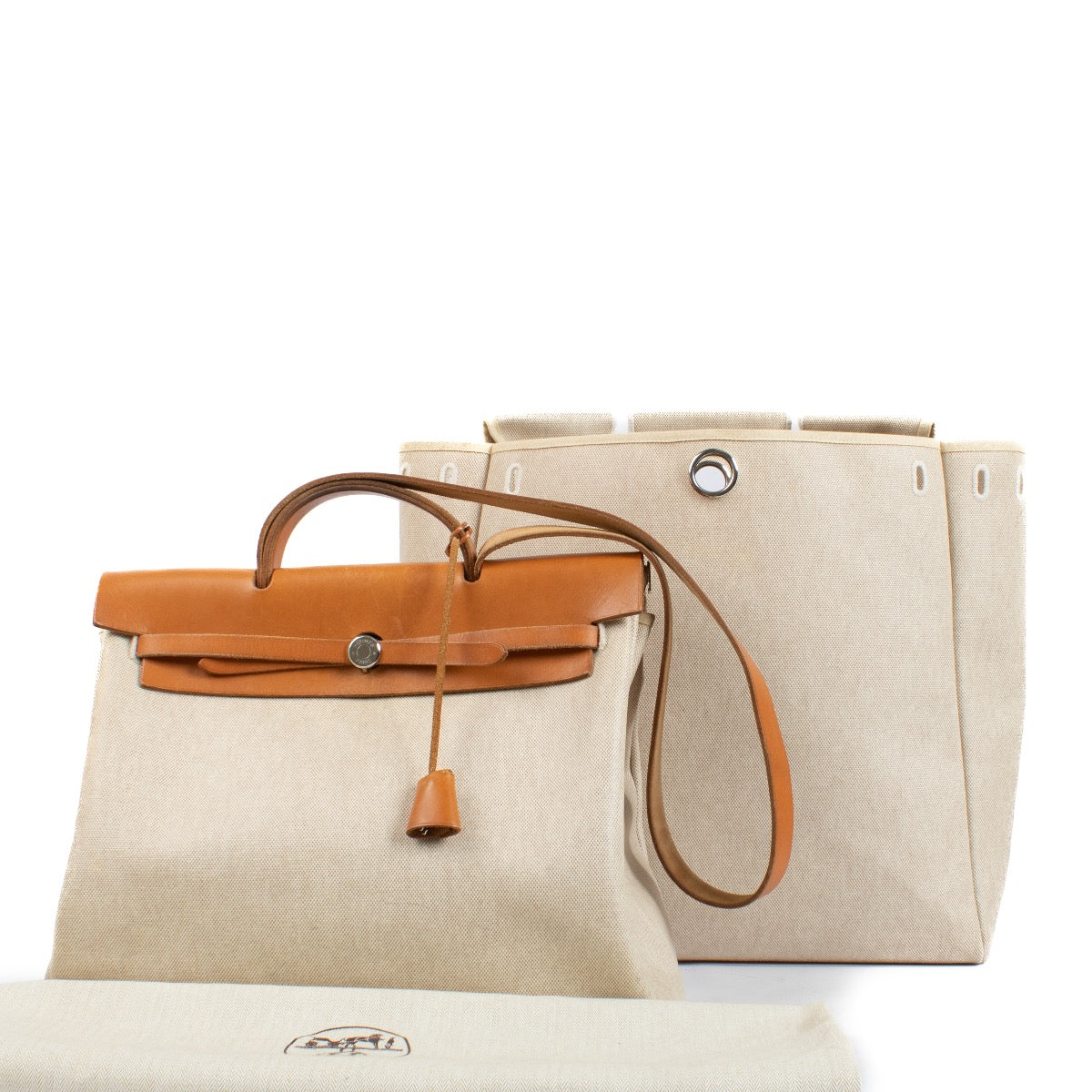 Buy authentic second hand Hermès Herbag 2-in-1 Toile H/Vache Hunter PHW at Labellov.com