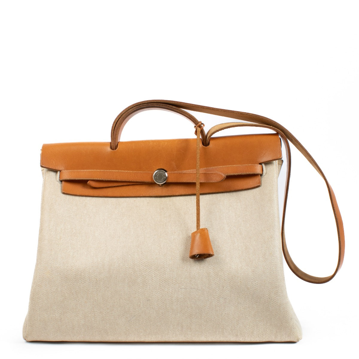 Buy authentic second hand Hermès Herbag 2-in-1 Toile H/Vache Hunter PHW at Labellov.com