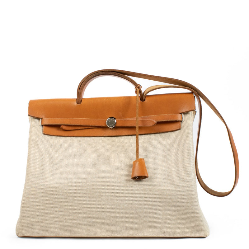 Buy authentic second hand Hermès Herbag 2-in-1 Toile H/Vache Hunter PHW at Labellov.com