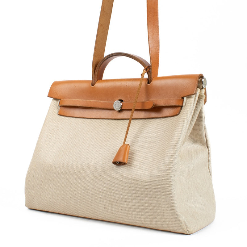 Buy authentic second hand Hermès Herbag 2-in-1 Toile H/Vache Hunter PHW at Labellov.com