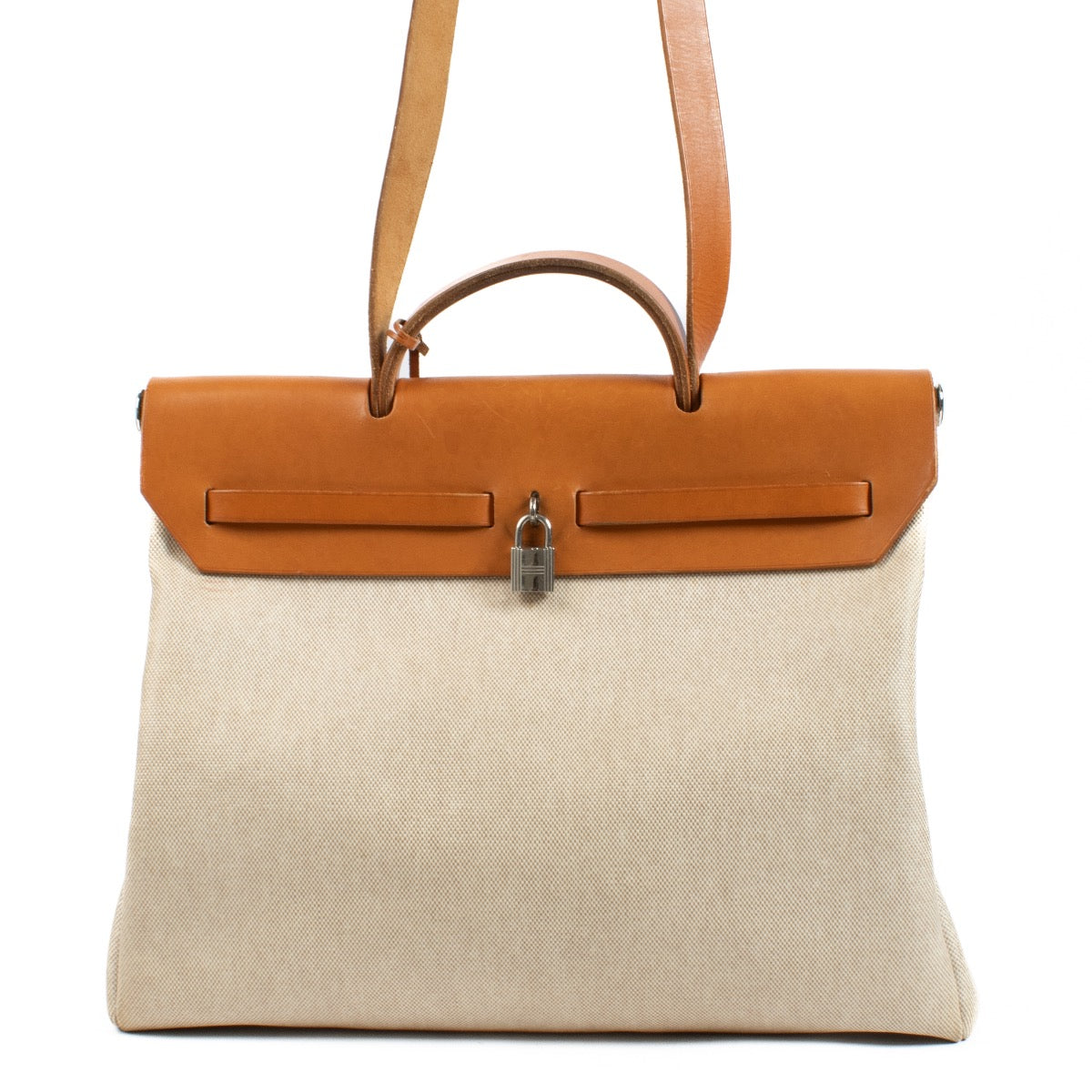 Buy authentic second hand Hermès Herbag 2-in-1 Toile H/Vache Hunter PHW at Labellov.com