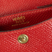 Hermès Red Leather Wallet, compact and stylish, with compartments for cards, cash, and coins in a vibrant red design. Shop now on Labellov.com.