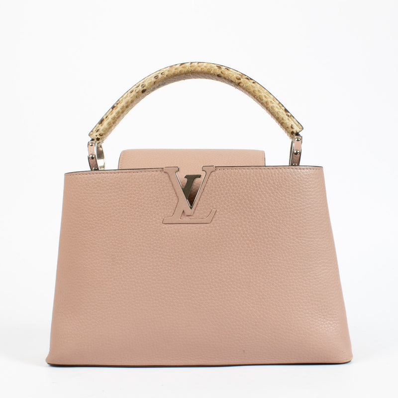 Discover the pre-loved Louis Vuitton Capucines MM in Galet with rare python handle and signature LV monogram. A timeless luxury handbag available at Labellov – your destination for designer bags in Antwerpen and Knokke.