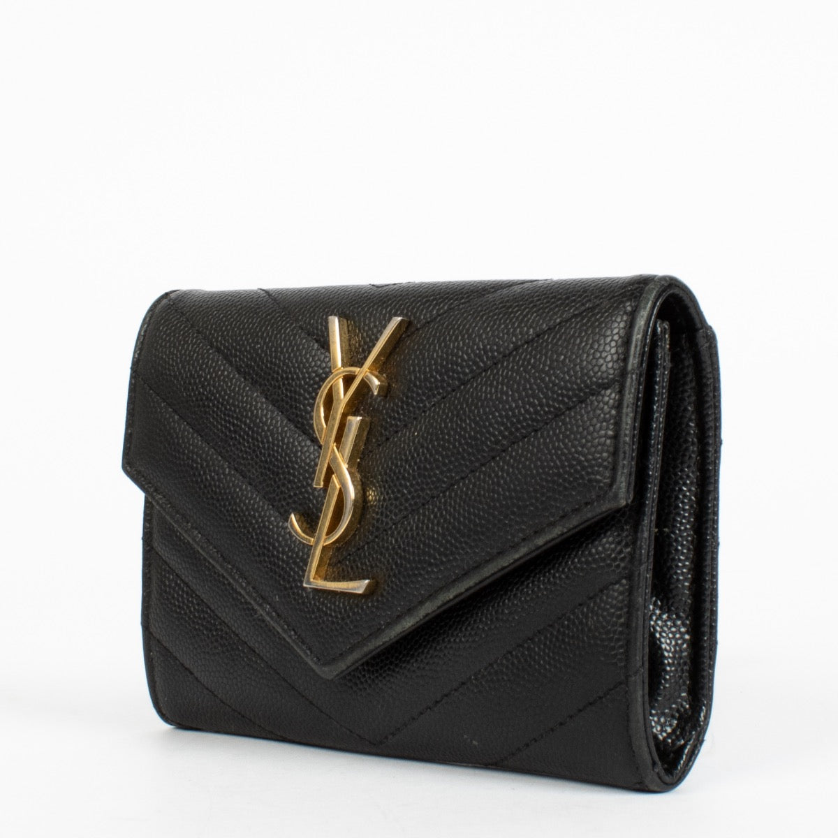 Shop the pre-loved Saint Laurent Black Cassandre Wallet in grained leather with gold YSL logo. A sleek designer essential, now available at Labellov in Antwerpen and Knokke.