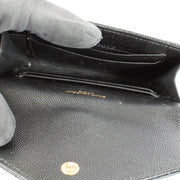 Shop the pre-loved Saint Laurent Black Cassandre Wallet in grained leather with gold YSL logo. A sleek designer essential, now available at Labellov in Antwerpen and Knokke.