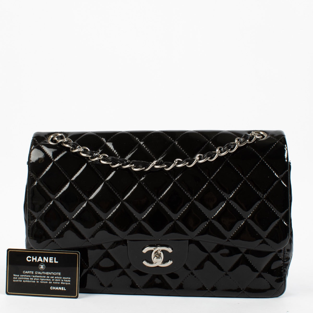 Shop safe online at Labellov in Antwerp, Brussels and Knokke this 100% authentic second hand Chanel Black Patent Large Classic Flap Bag. Veilig online tweedehands authentieke Chanel Black Patent Large Classic Flap Bag handtas kopen bij Labellov.