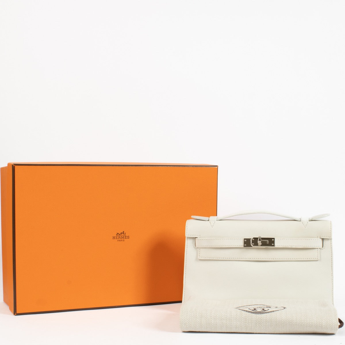 2010 Hermès Kelly Mini Pochette White Swift Palladium Hardware