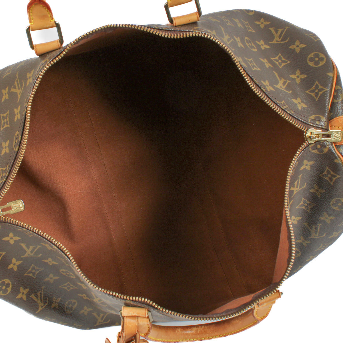 Interior of the Louis Vuitton Monogram Keepall 50 Travel Bag for the best price.