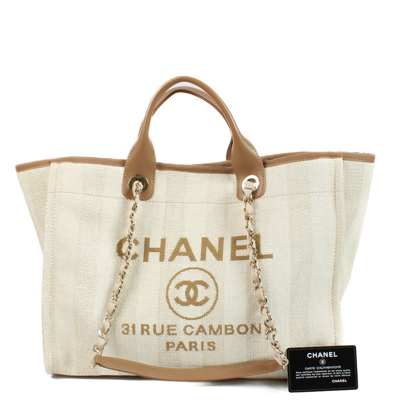 Are you looking for an authentic designer bag? We buy and sell your preloved and new items for the best price! Chanel Beige Striped Canvas Deauville Shopper Bag