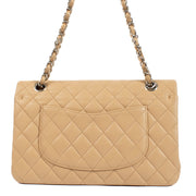 The Chanel Beige Lambskin Medium Classic 11.12 Bag exudes timeless elegance with its buttery-soft lambskin leather, gold-tone hardware, and iconic turn-lock closure. A must-have luxury piece. Shop now on Labellov.com.