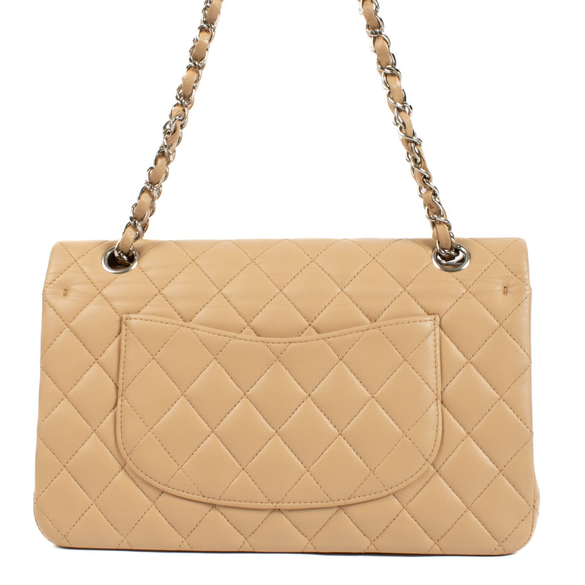 The Chanel Beige Lambskin Medium Classic 11.12 Bag exudes timeless elegance with its buttery-soft lambskin leather, gold-tone hardware, and iconic turn-lock closure. A must-have luxury piece. Shop now on Labellov.com.